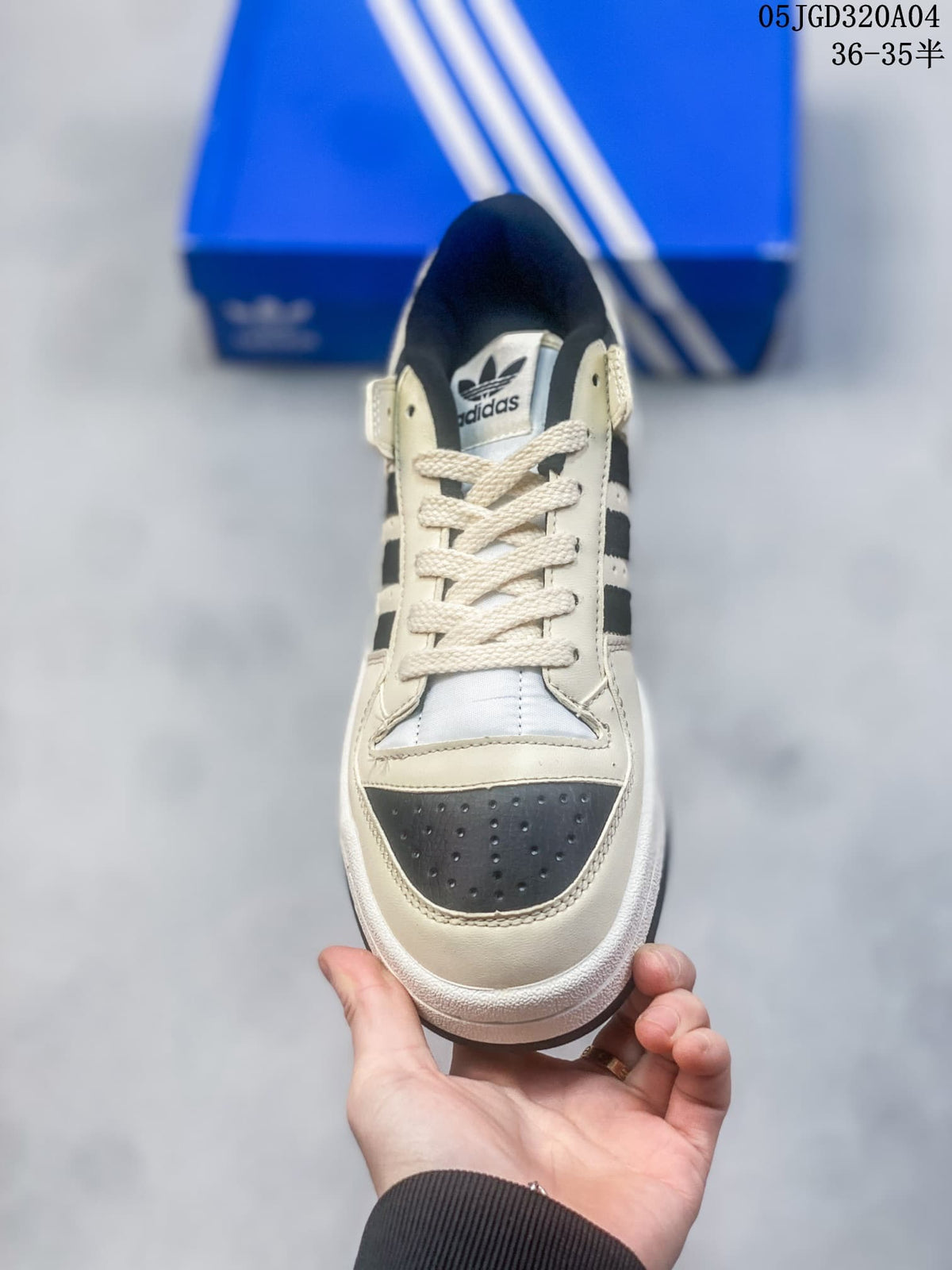 Front view showing the laces, ankle straps, and perforated toe panels.