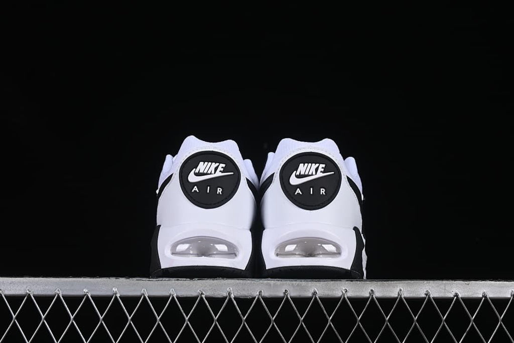 Rear view of both shoes showing heel branding and air units.