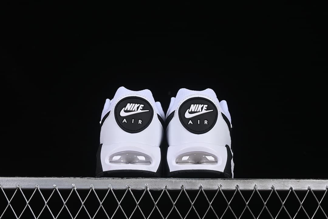 Rear view of both shoes showing heel branding and air units.