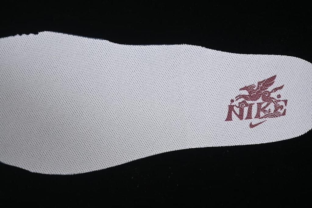 Light-colored shoe insole with printed graphic shown separately