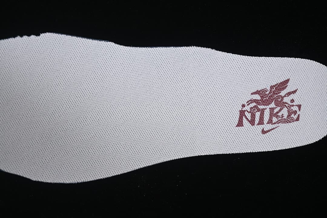 Light-colored shoe insole with printed graphic shown separately