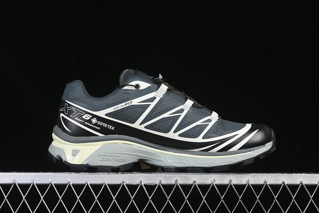 Side profile showing the XT-6 GTX markings, lace-up design, and sculpted midsole.