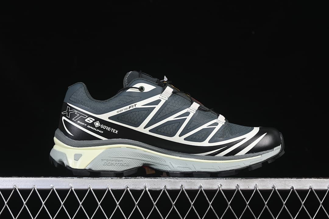 Side profile showing the XT-6 GTX markings, lace-up design, and sculpted midsole.