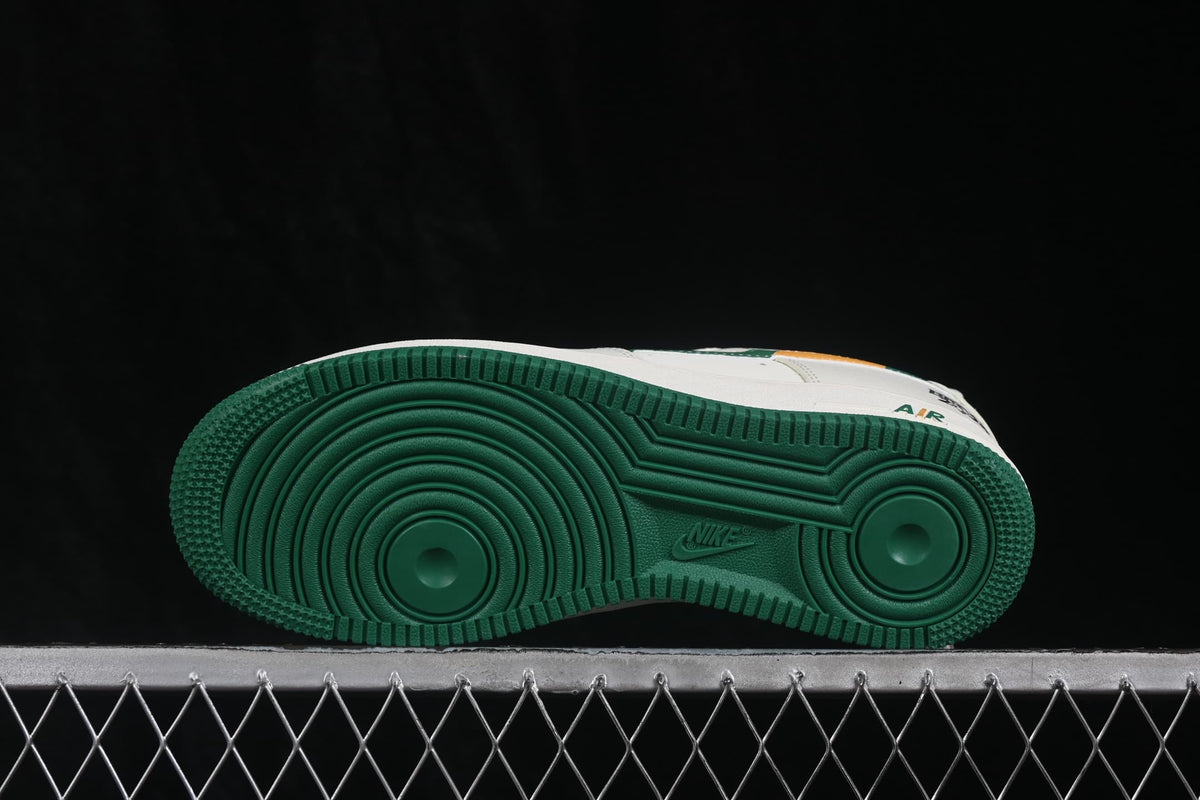 Close underside view showing the green rubber outsole with circular traction rings and Nike branding.
