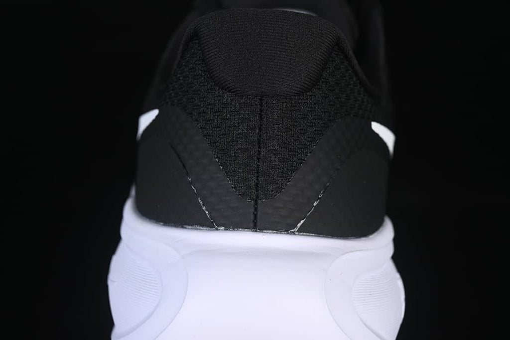 Rear view highlighting the black heel and white midsole