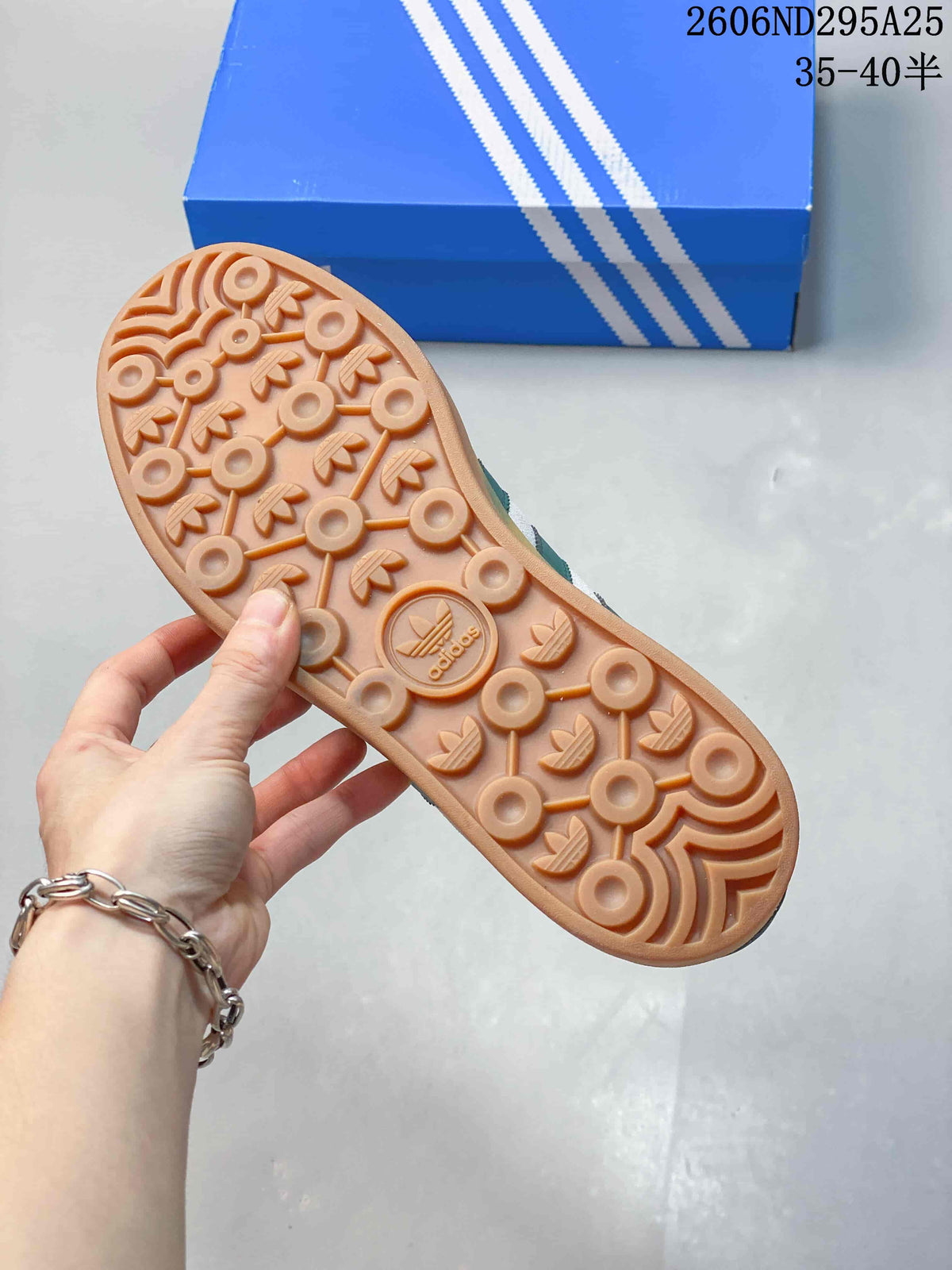 Close-up of the gum-colored outsole with circular tread details