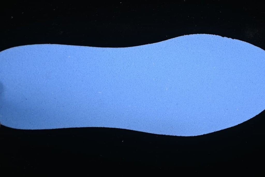 Blue shoe-shaped insert shown against a black background