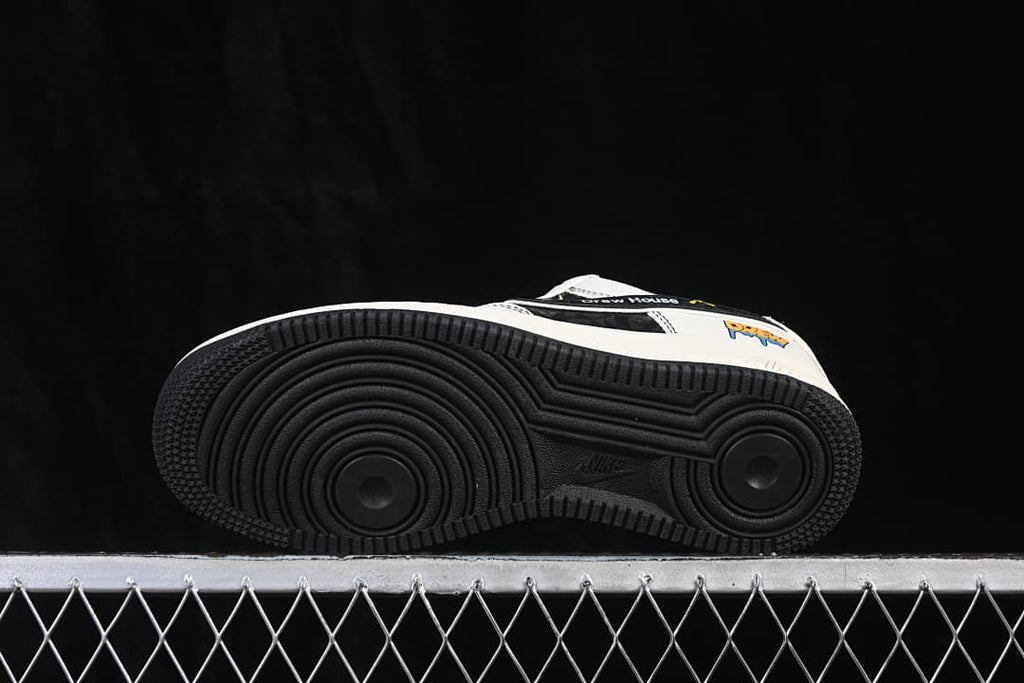 Underside view showing the black circular-patterned outsole