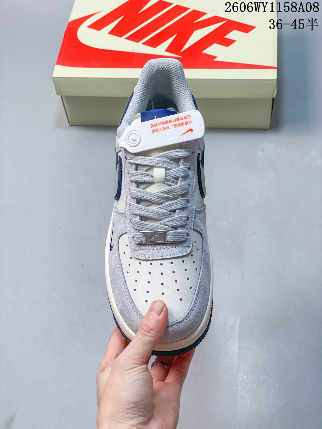 Top view of a Nike Air Force 1 '07 sneaker showing its perforated toe and laces