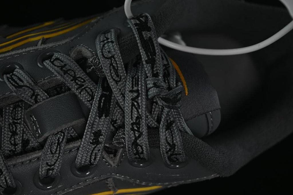 Close-up of patterned laces and lace eyelets