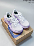 Pair of white and purple ASICS NOVABLAST 6 running shoes on a shoebox