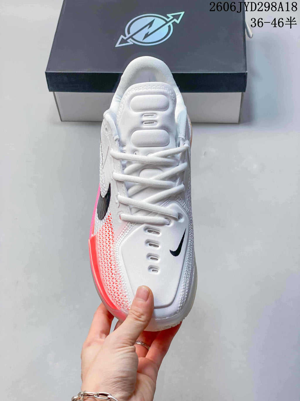 Top view showing the laces, padded tongue and white upper of a Nike Air Zoom GT Cut shoe