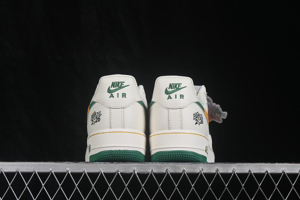 Rear view showing green Nike Air branding, Brazil 2026 graphics, and the green outsole.