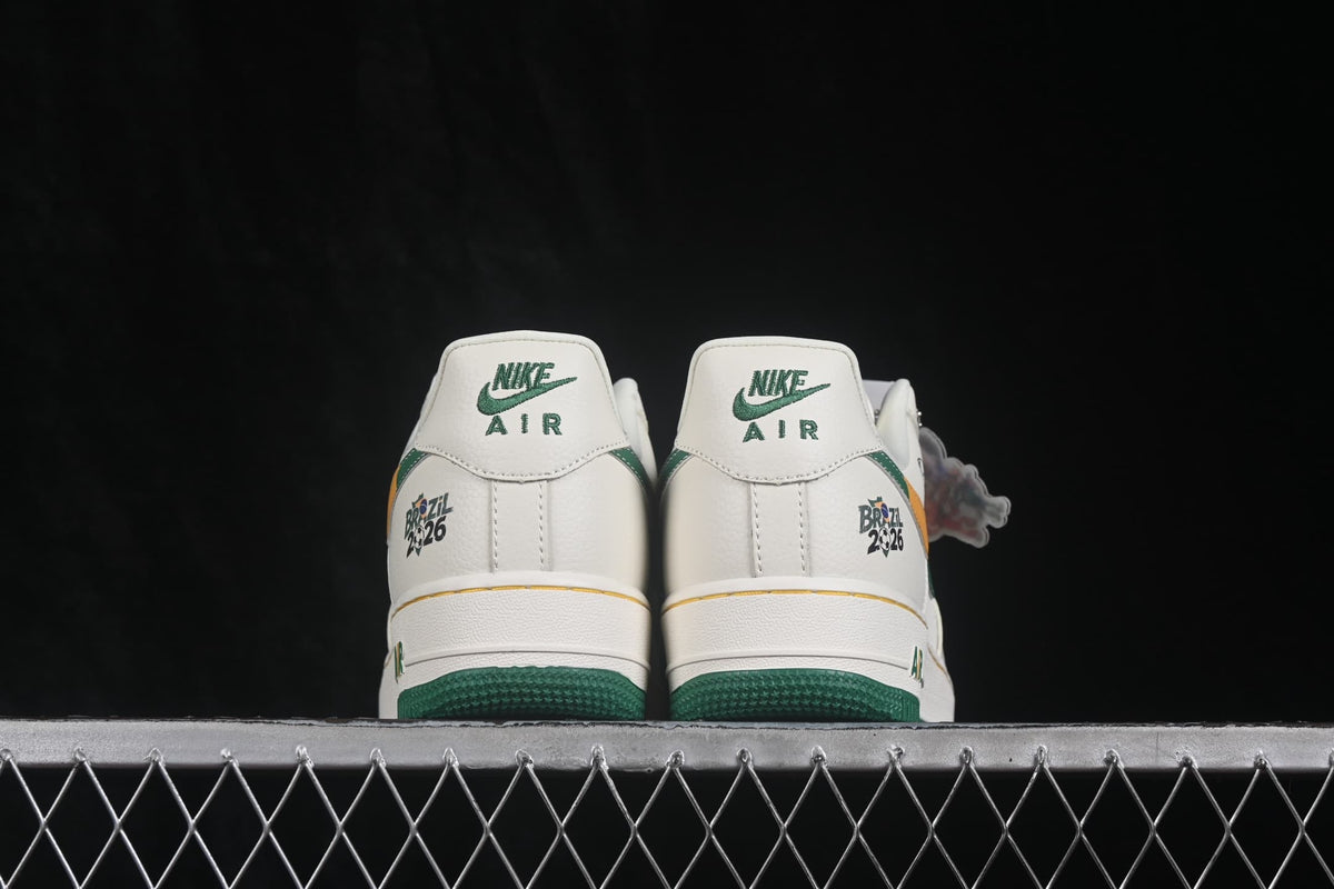 Rear view showing green Nike Air branding, Brazil 2026 graphics, and the green outsole.