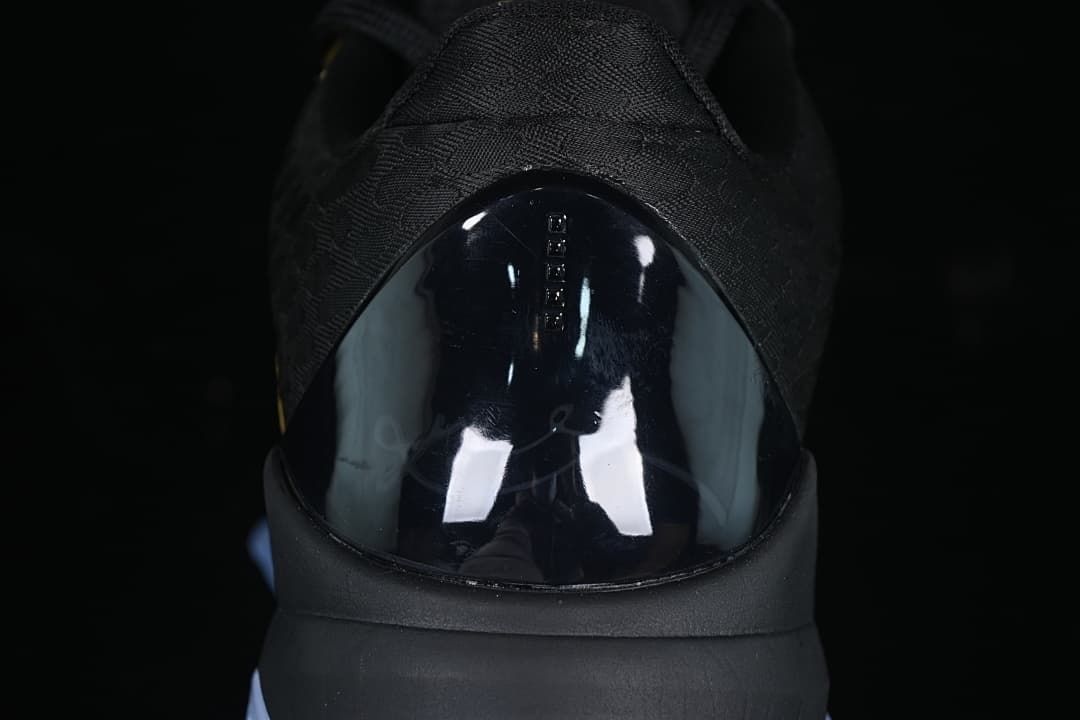 Rear close-up of the shoe with a glossy black heel panel