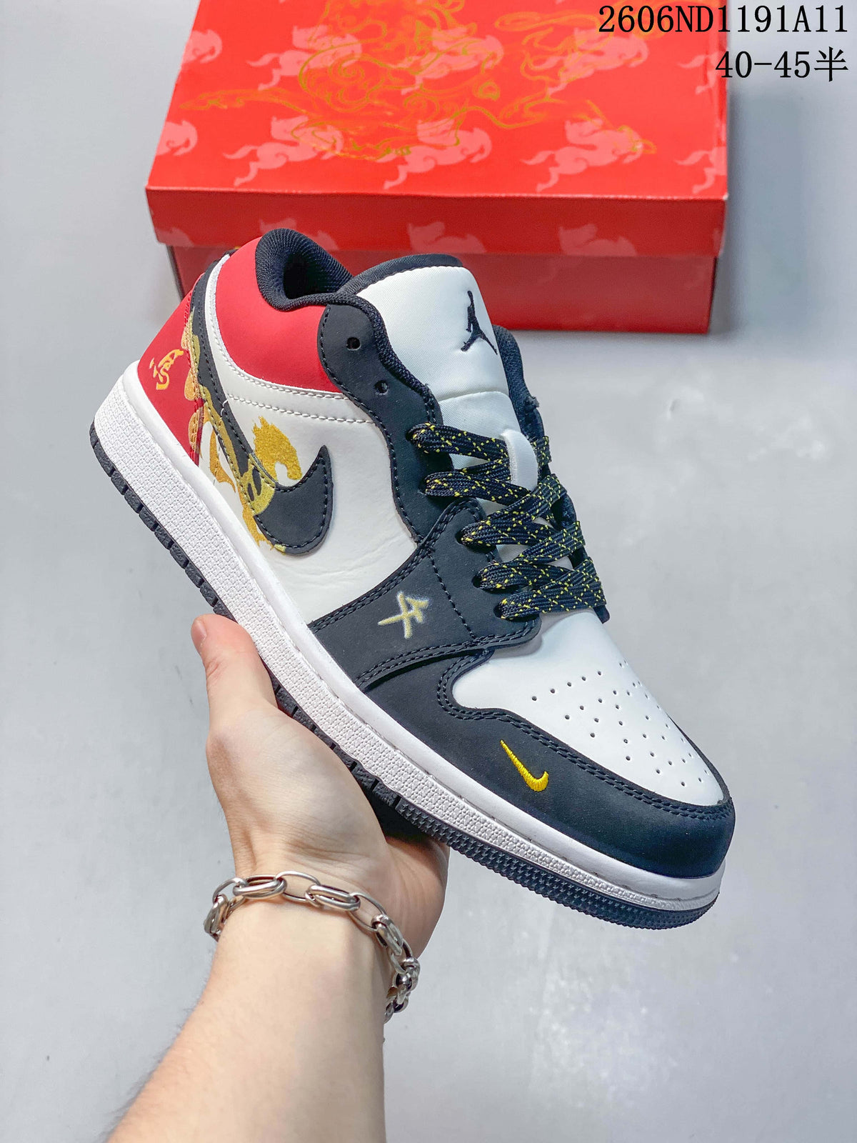 Angled side view showing the sneaker's graphic panels and color blocking