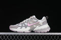 Nike V2K Run Runtekk sneaker in white, gray, and pink, side view