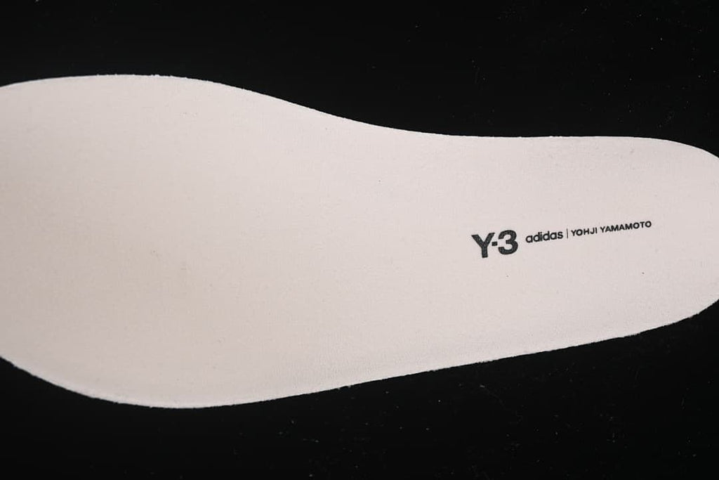 Insole marked Y-3, adidas and Yohji Yamamoto.
