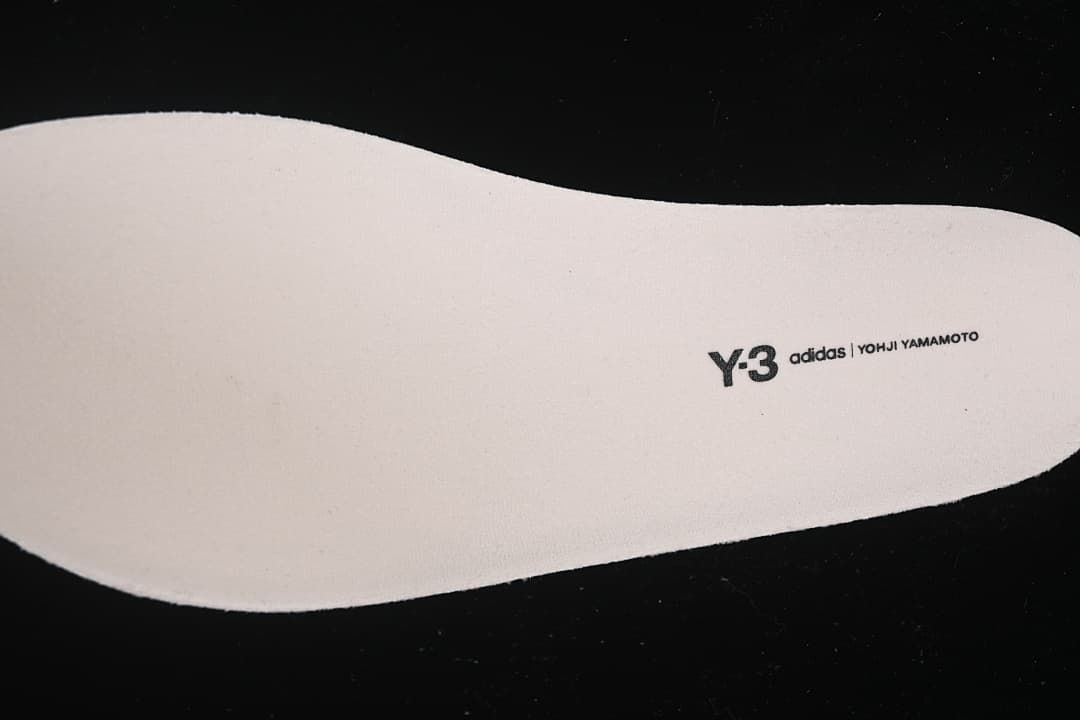 Insole marked Y-3, adidas and Yohji Yamamoto.