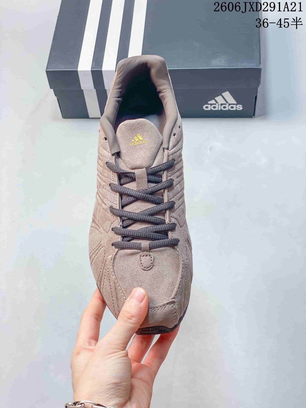 Top view of the sneaker showing its laces and stitched upper