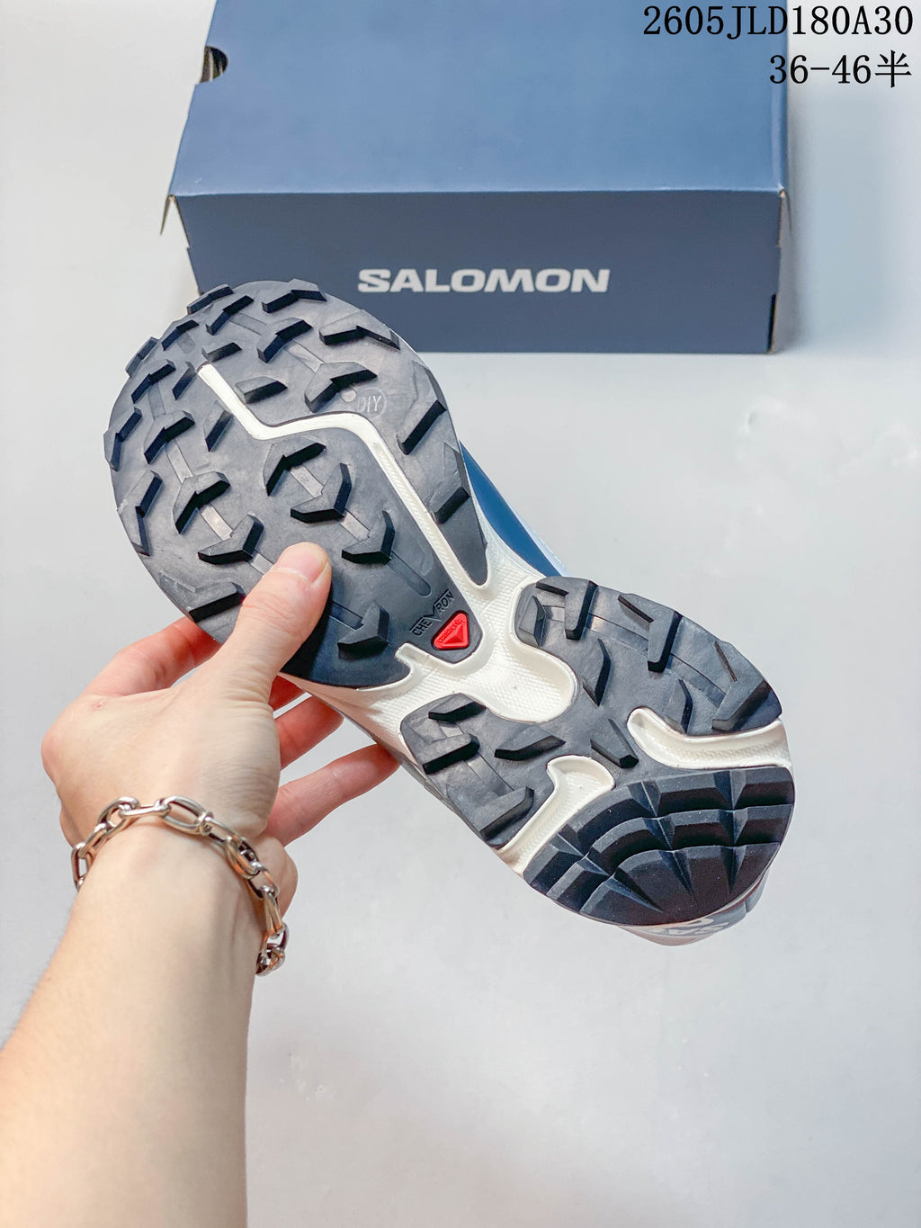 Close-up of the shoe outsole showing its lugged tread