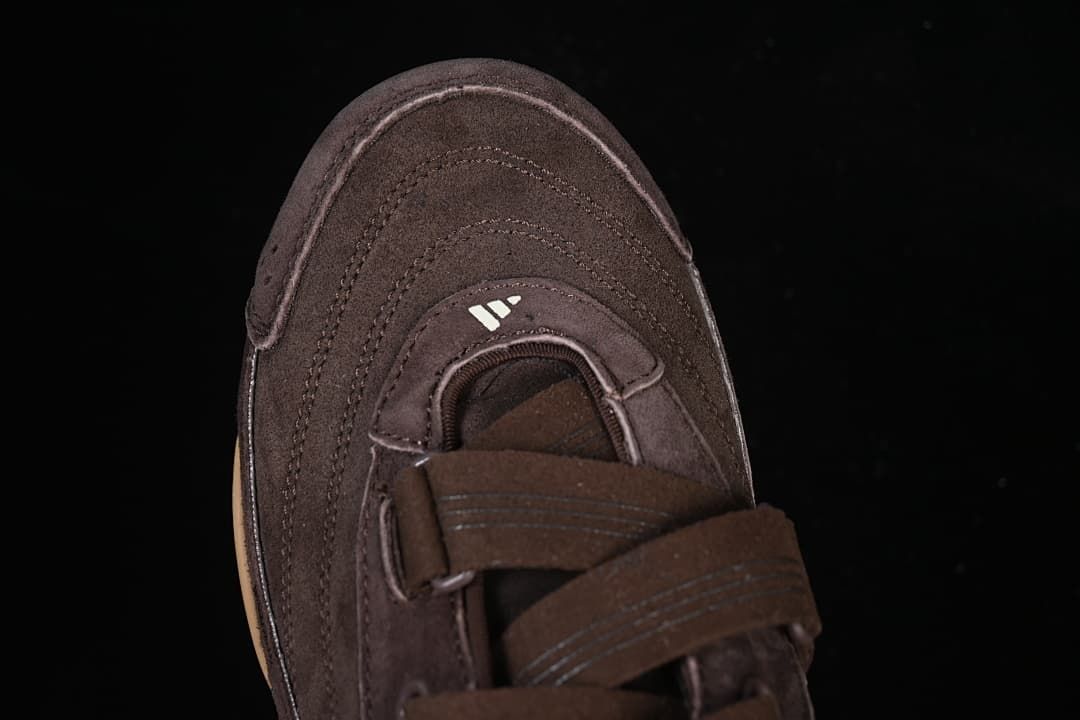 Top view highlighting the toe stitching and strap closure.
