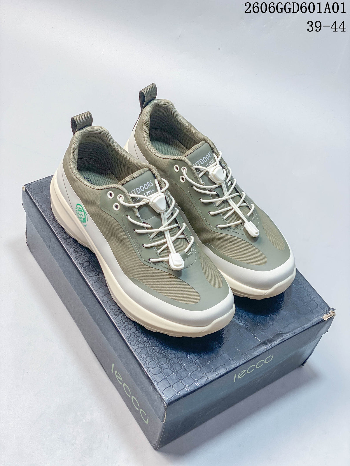Pair of sage and cream ECCO color-block lace-up sneakers shown on a shoebox; image overlay lists sizes 39–44.