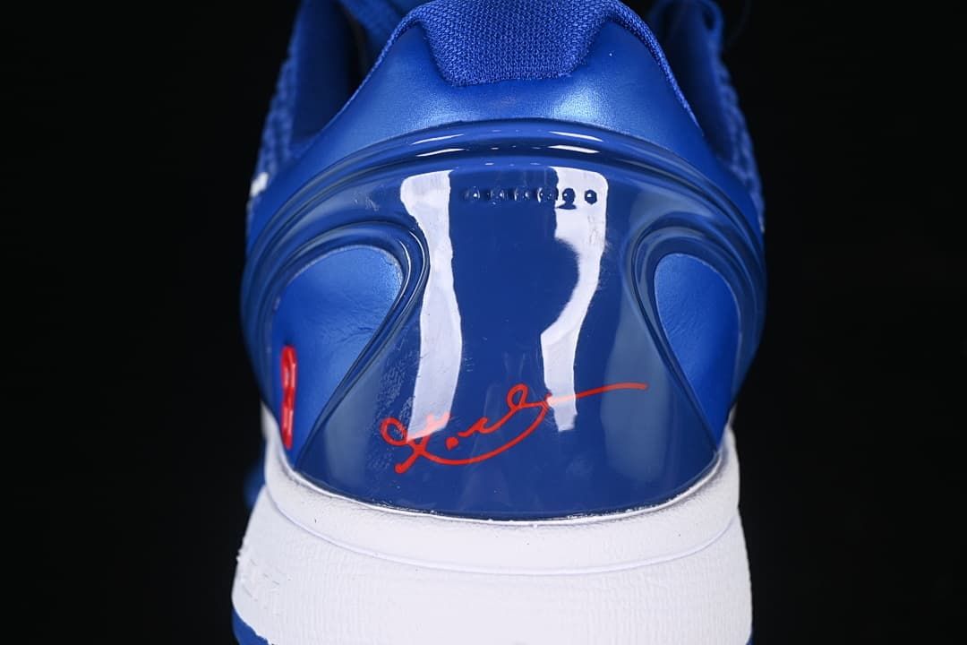 Rear view of the blue shoe with red Kobe signature detail