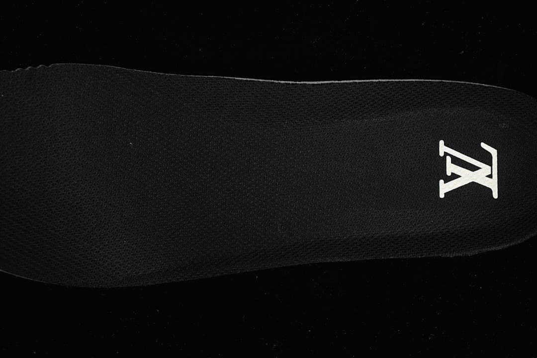 Black insole with a white logo