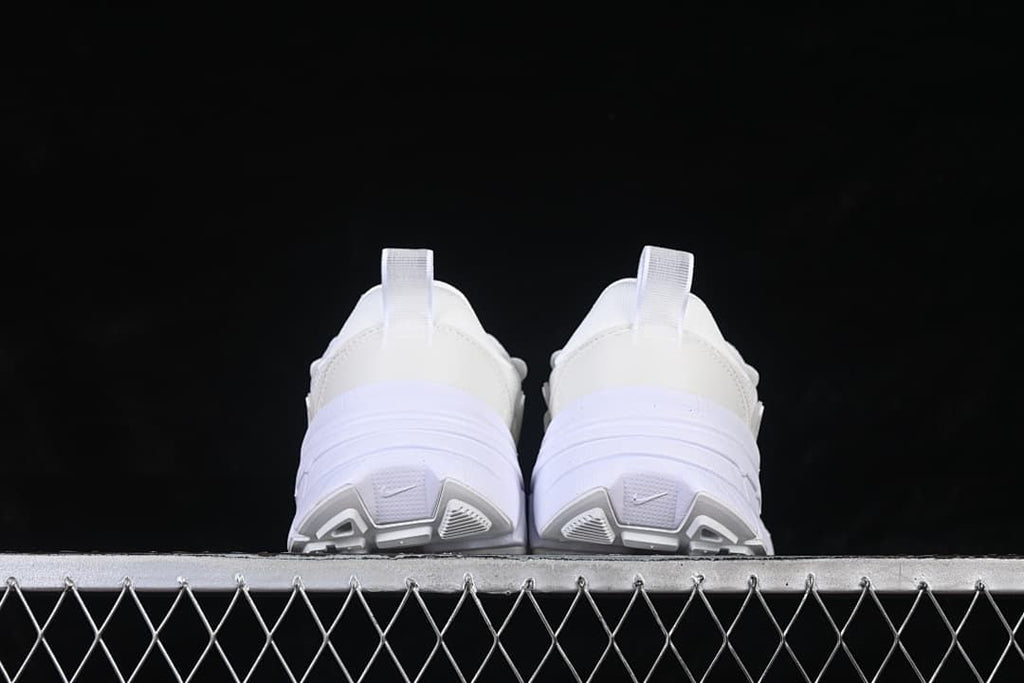 Rear view of the pair showing heel pulls and outsole details