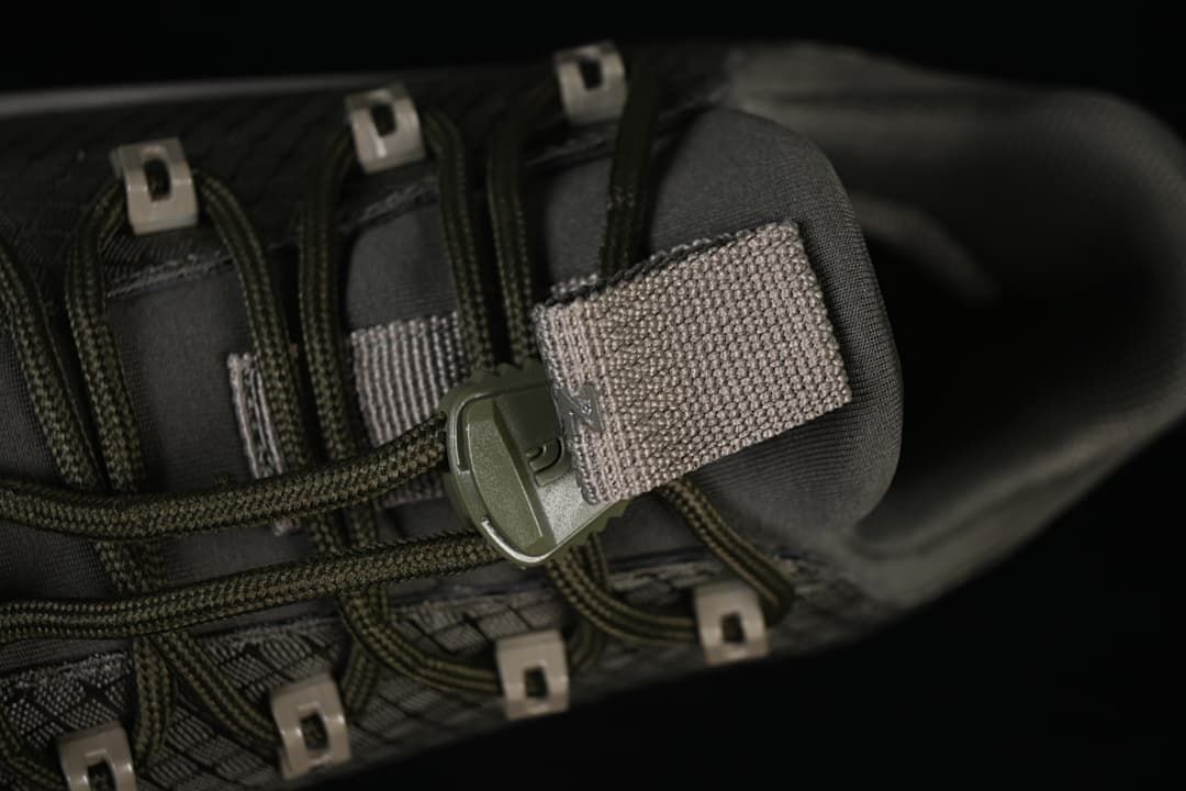Close-up of the lace cord lock and tongue pull tab
