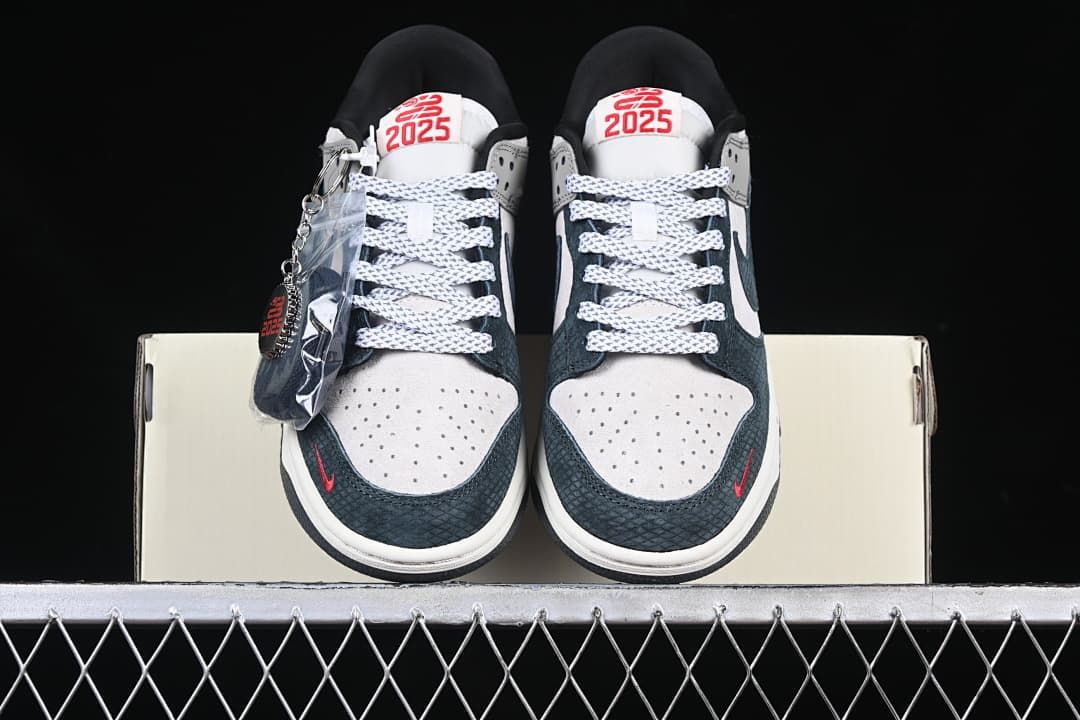 Front view of the pair showing the toe panels, laces, and tongue graphics