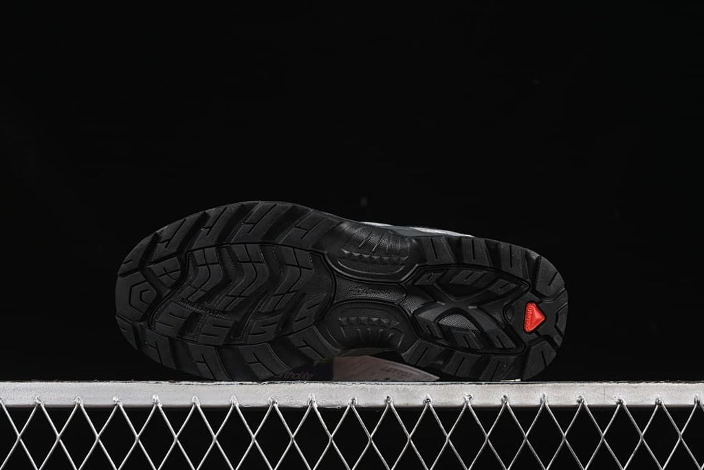 Underside view showing the patterned black outsole