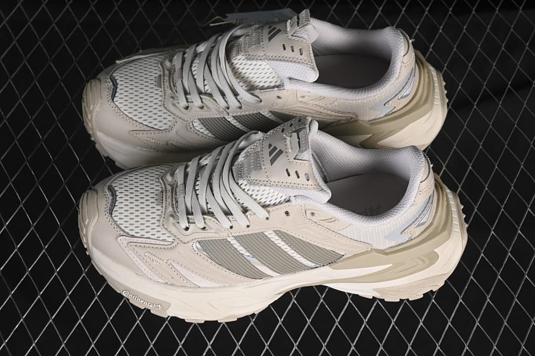 Pair of beige and gray XLG Storm Edge sneakers from above