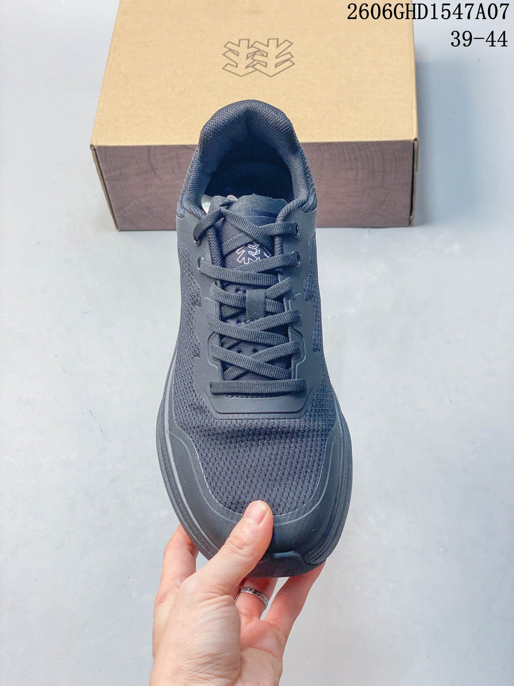 Top view of the sneaker showing its laces and textured panels