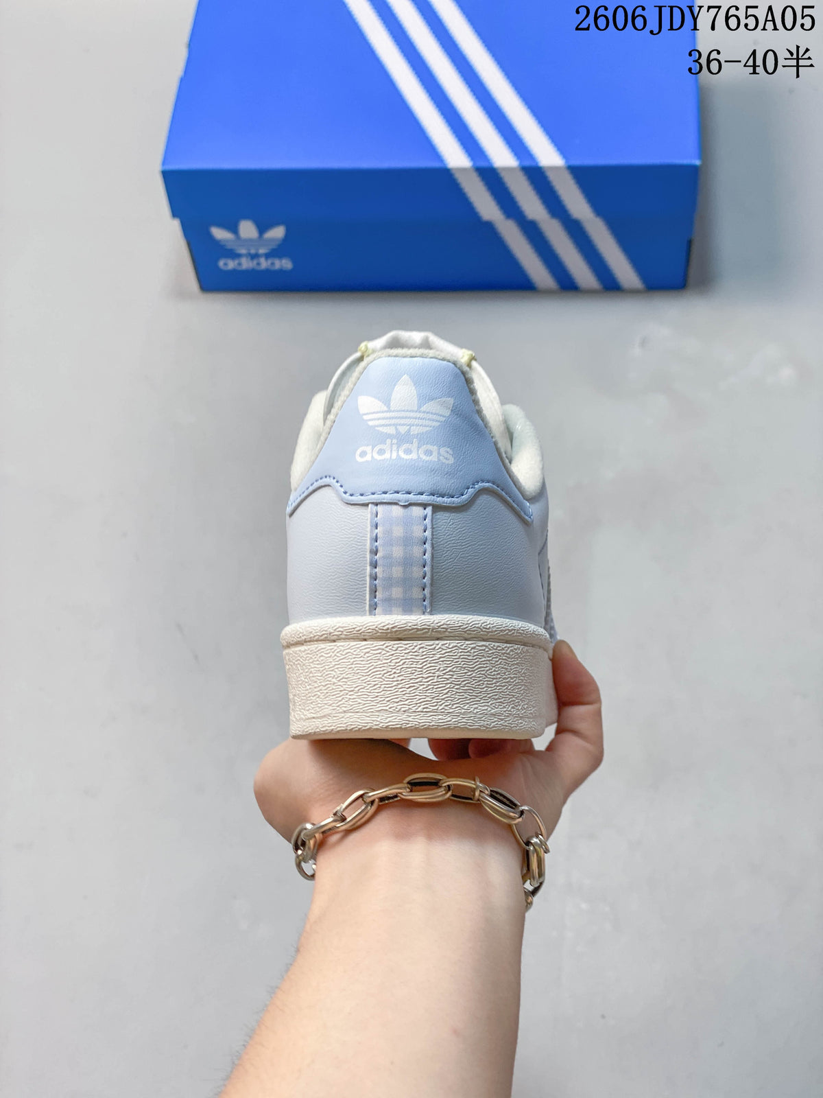Rear view showing the heel panel and pale blue color