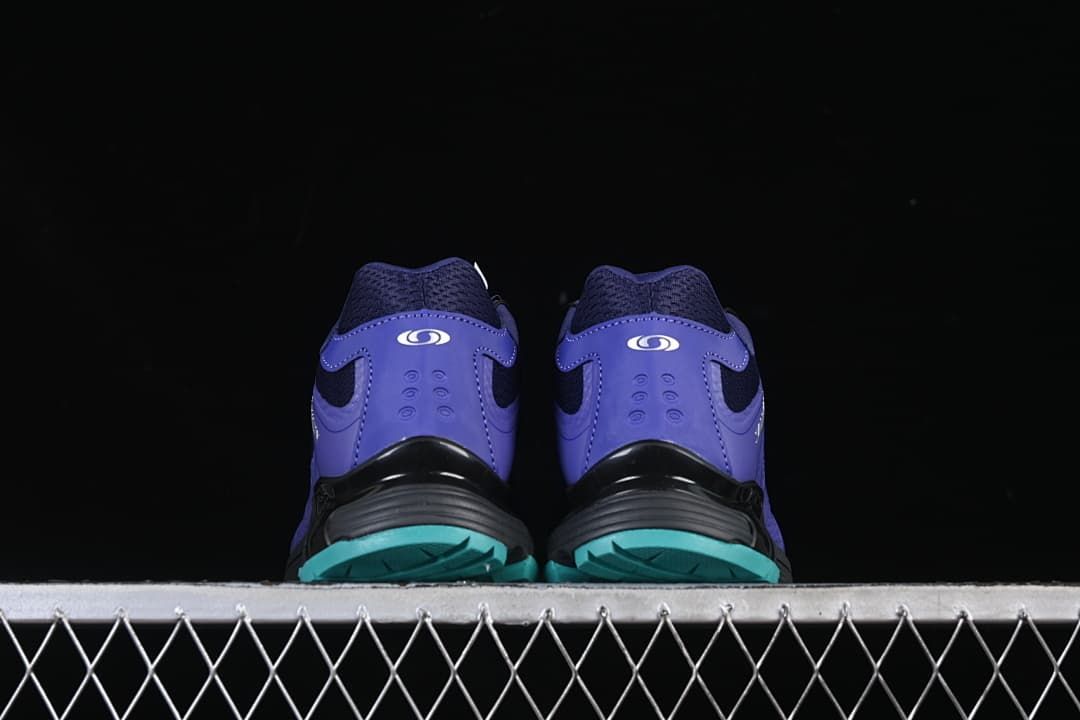Rear view of both shoes showing heel details and turquoise outsole sections.