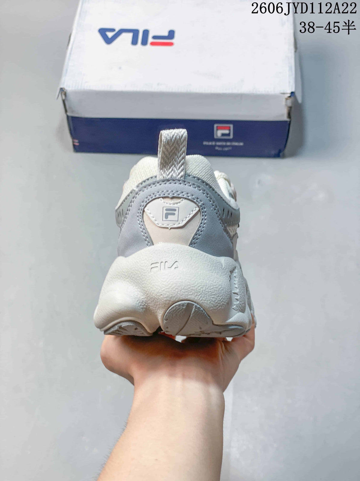 Rear view of the FILA FUSION Arceus sneaker showing its heel and sculpted sole