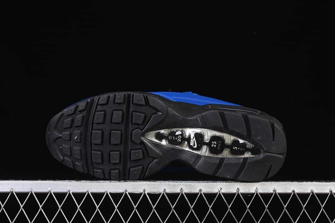Underside view of the black outsole and tread.
