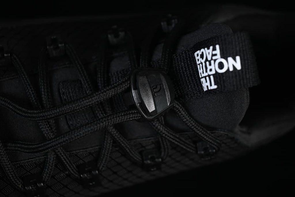 Close-up of the cord lacing, lock, and tongue.
