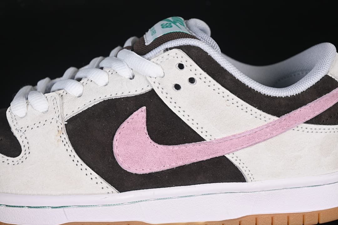 Close-up of the pink Swoosh and contrasting upper panels
