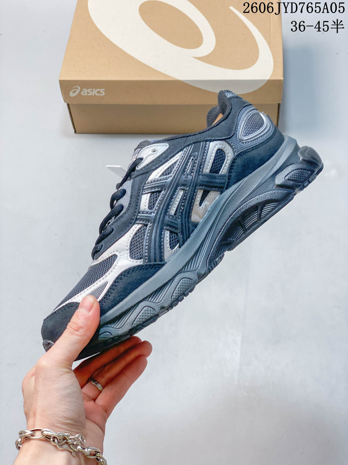 Side view showing the layered upper and sculpted sole