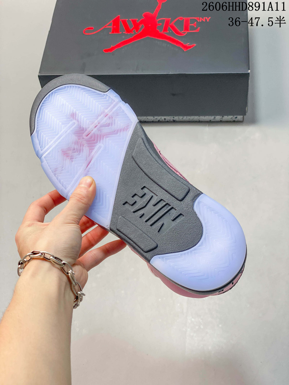 Underside of a sneaker showing a translucent-looking outsole with a dark center section.