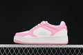 Side view of pink and white Alo Recovery Mode low-top sneakers