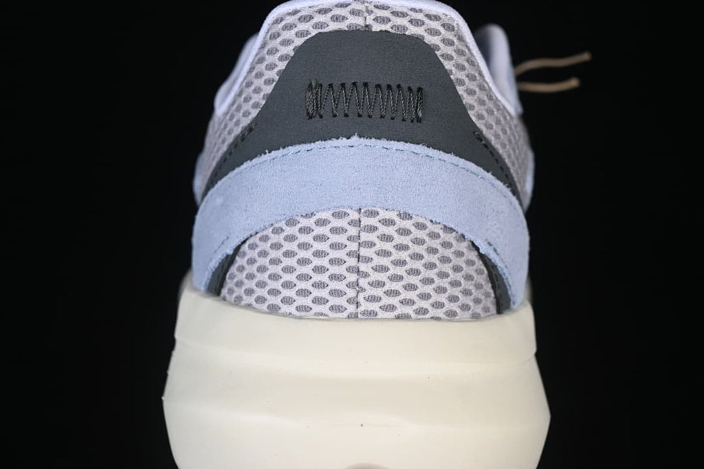 Close-up of the padded heel and mesh panels