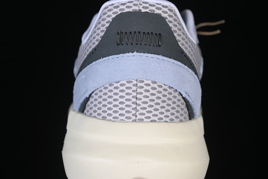 Close-up of the padded heel and mesh panels