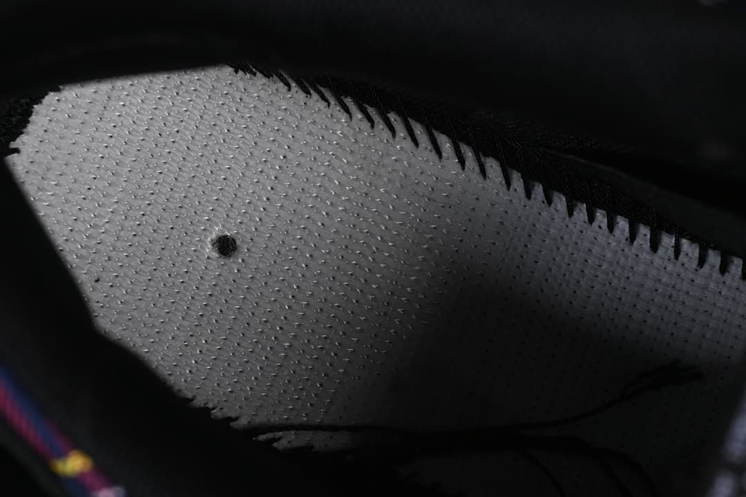 Close-up of the perforated interior lining.