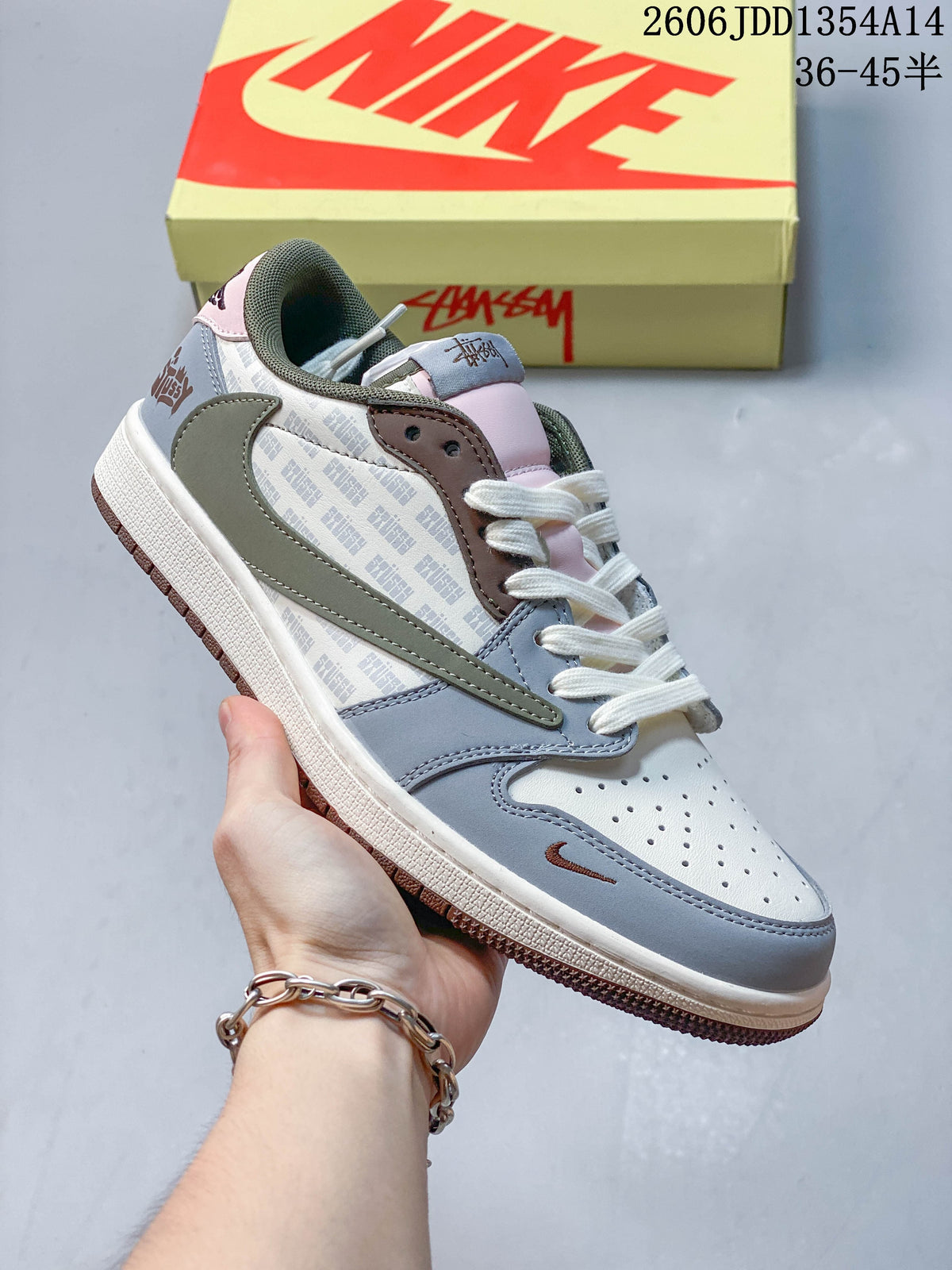 Angled side view of the low-top sneaker and its color-blocked panels