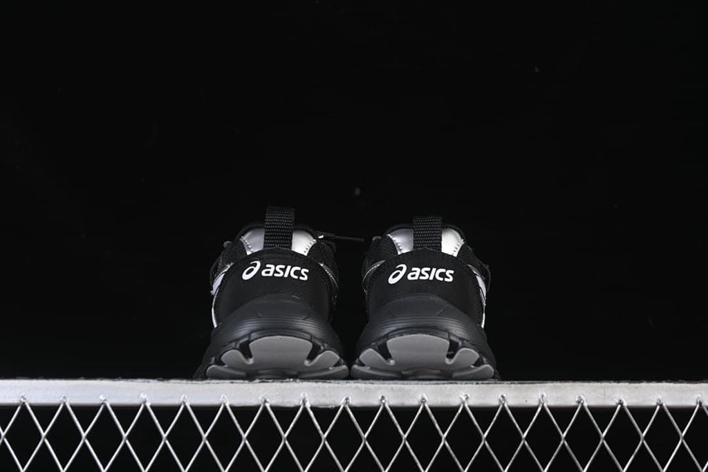 Rear view of the pair showing heel branding and outsole shape.