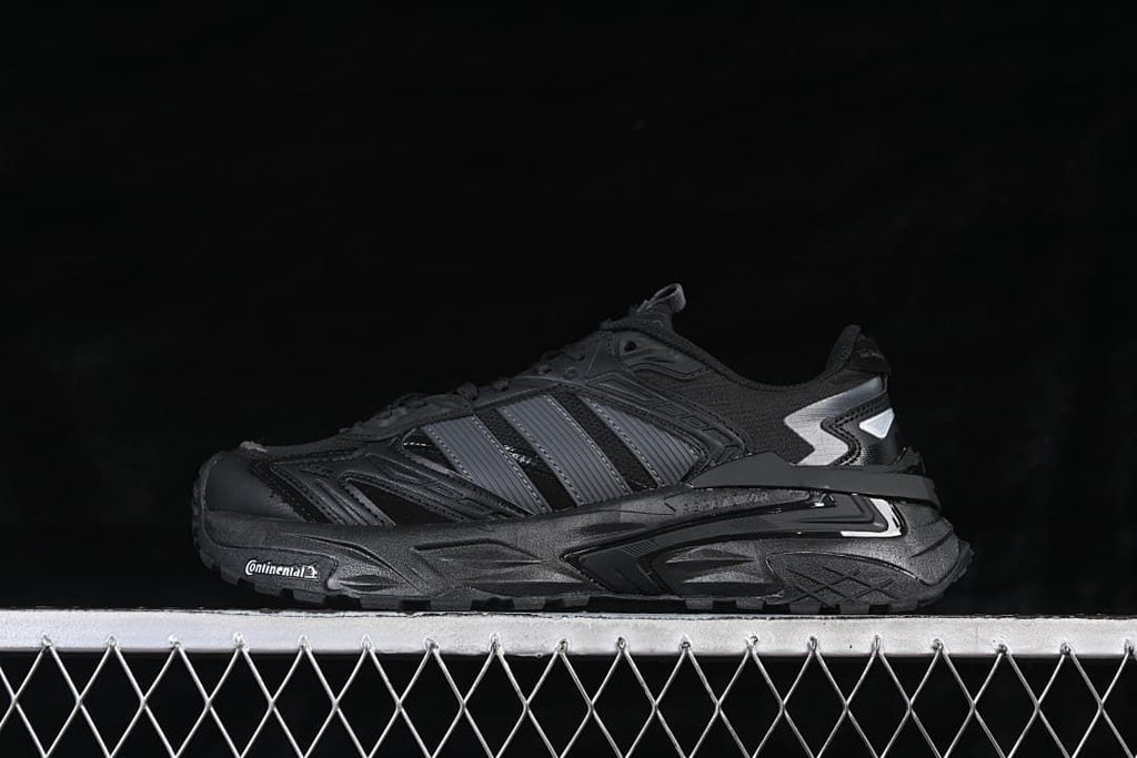 Side view of the black adidas XLG Storm Edge sneaker